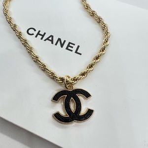 Charm with gold chain
